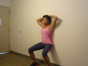 Wall sits (or wall squats) work your abdominal muscles and your legs.